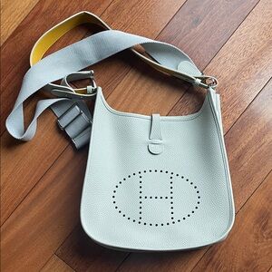 Light Gray Pebbled Leather Shoulder Bag with Perforated Logo
